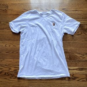Nike Heritage Tennis Tee.